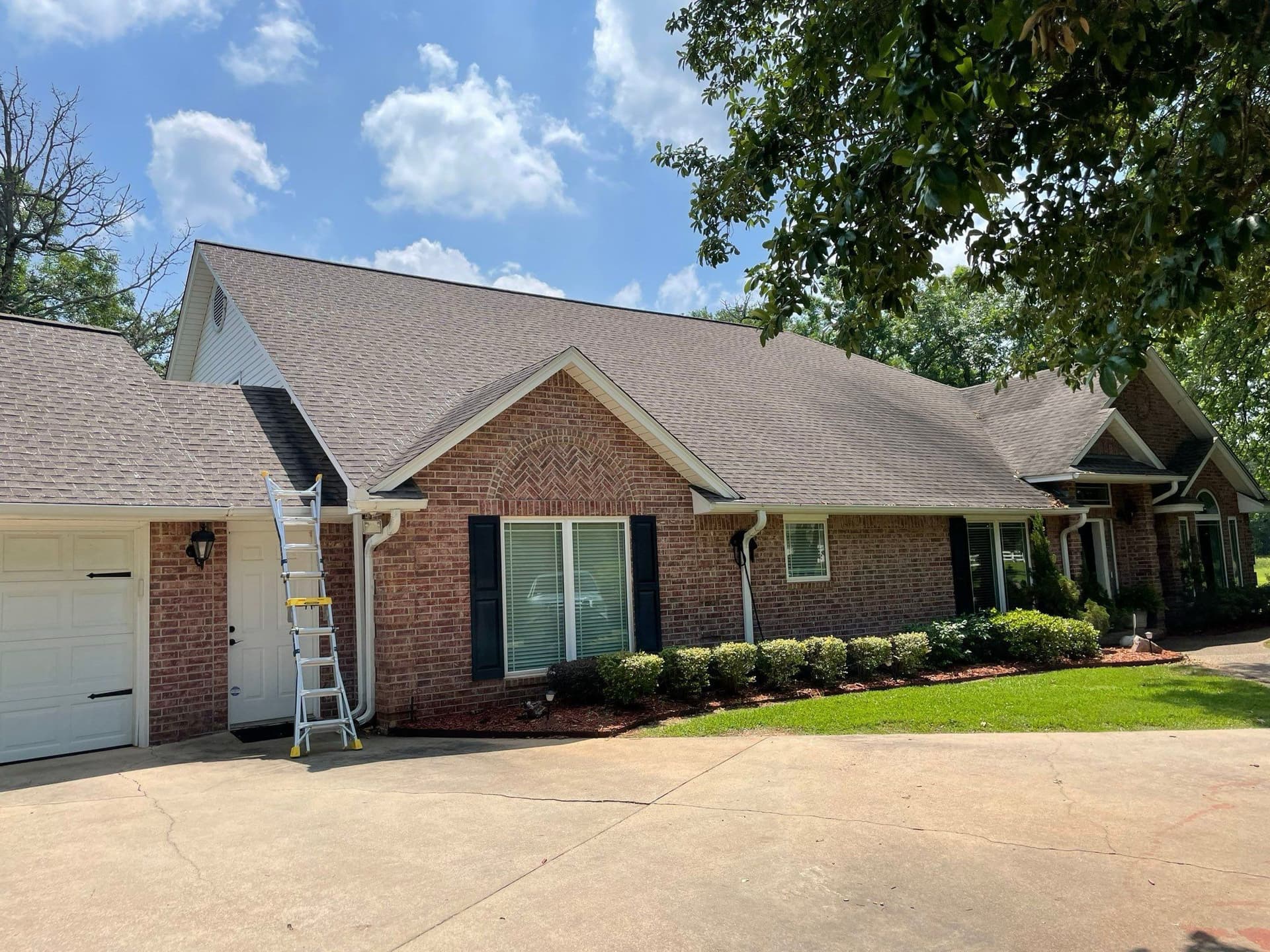 Thorough Roof Inspection for Brick Home image